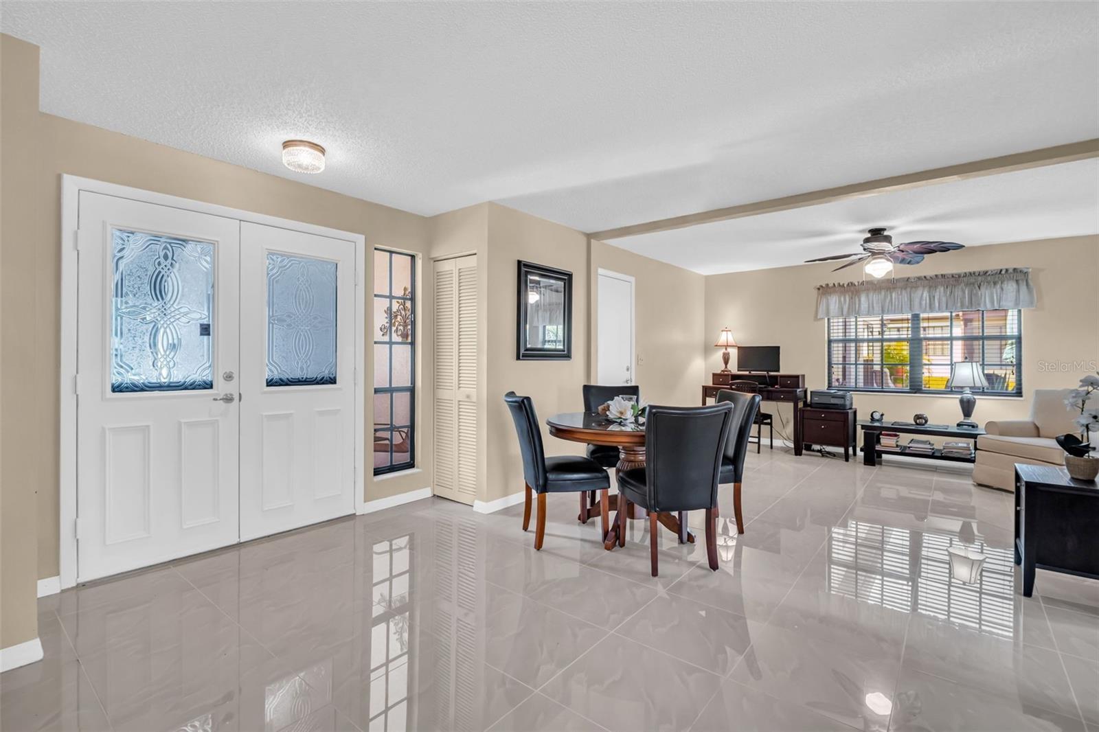 Double doors & entry closet at the foyer~