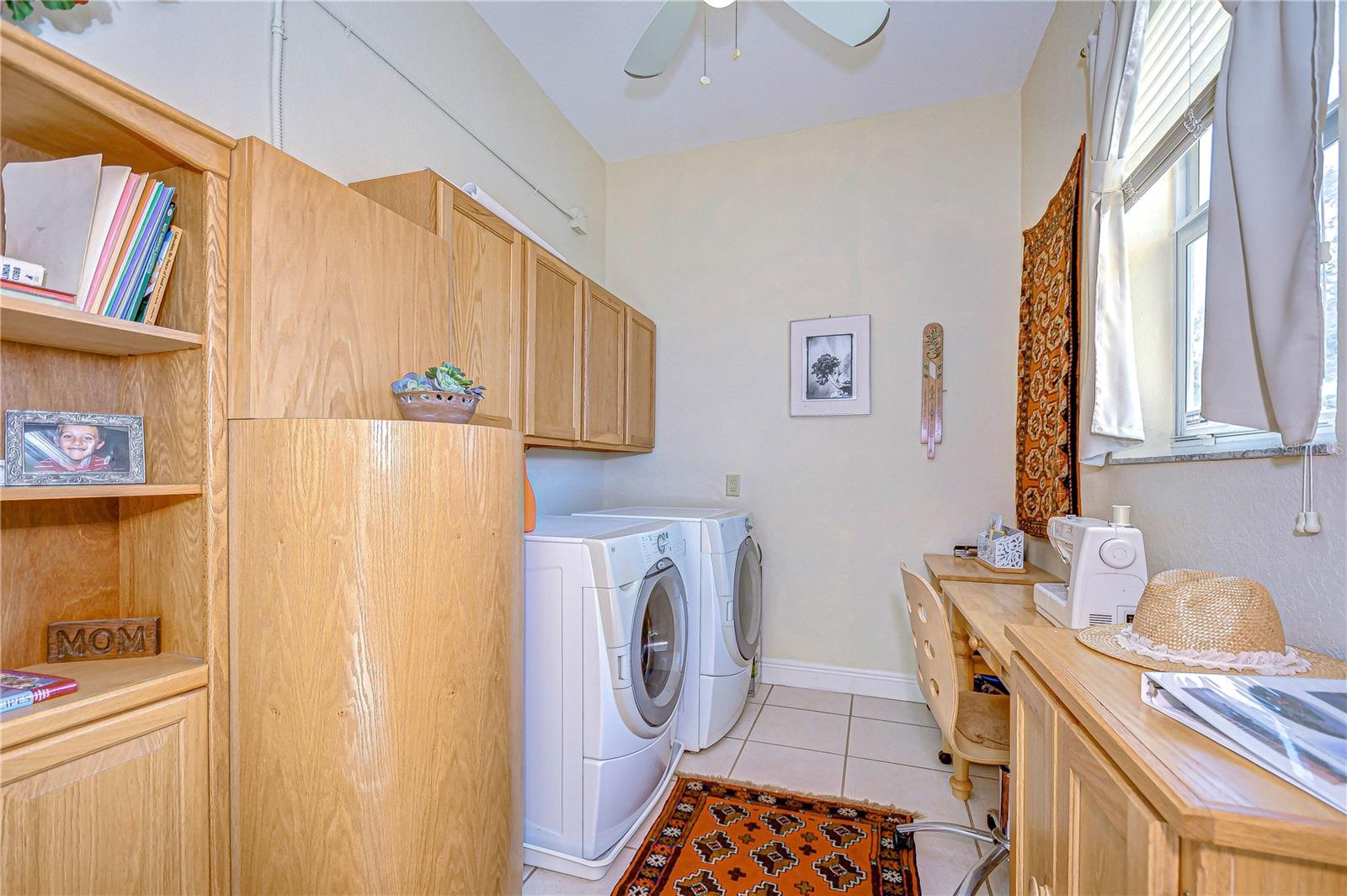 THE LAUNDRY ROOM IS ON THE MAIN FLOOR AND IS ALSO PERFECT FOR A CRAFT ROOM!