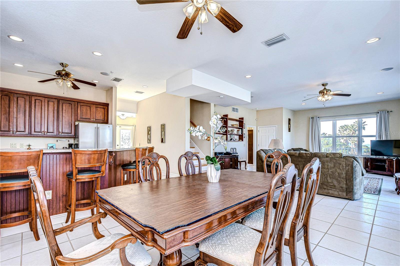 THE OPEN FLOORPLAN KEEPS THE FAMILY TOGETHER AND MAKES ENTERTAINING A BREEZE!