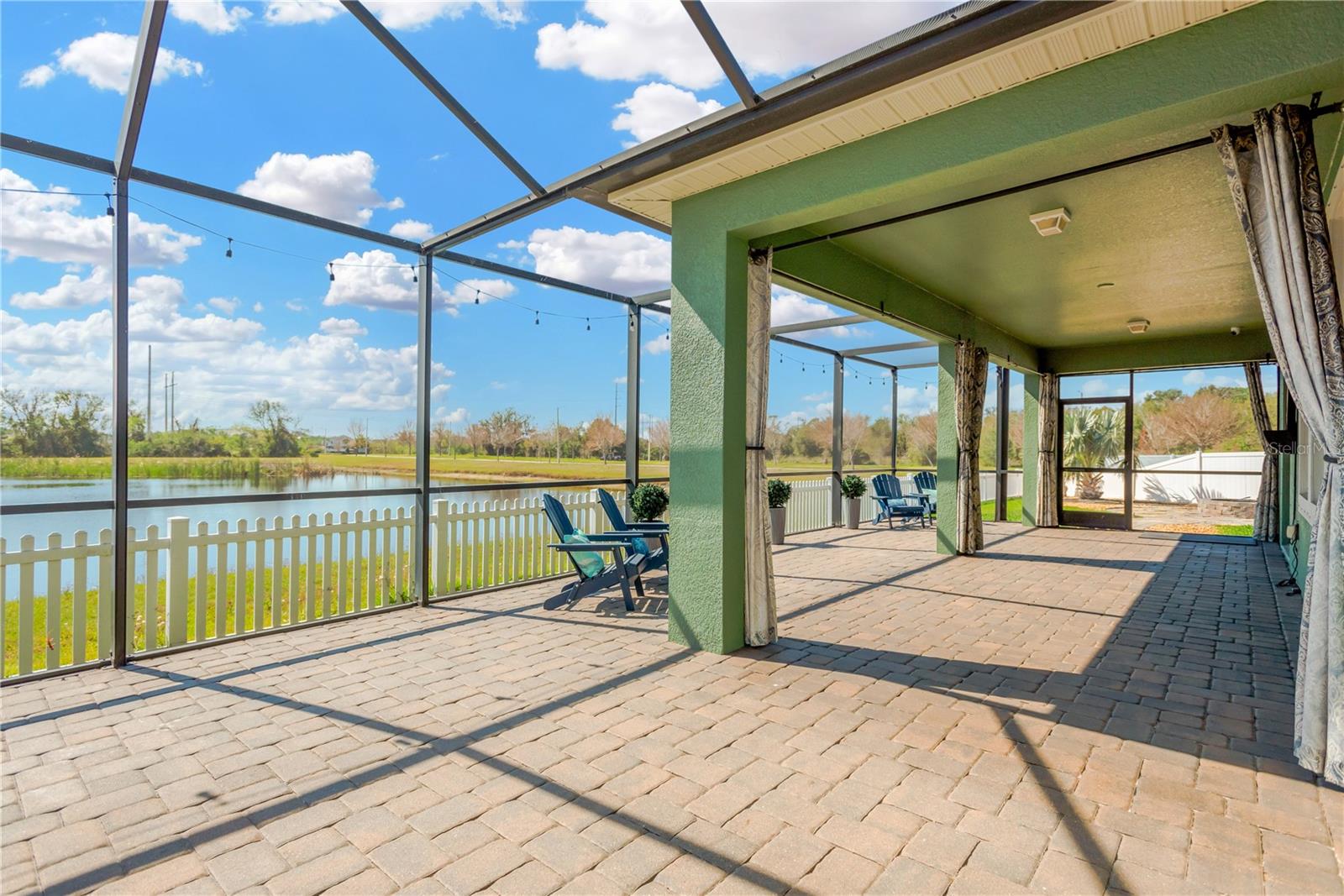 The new owners will appreciate the pavered, screened patio with peaceful pond views—ideal for sipping morning coffee or hosting evening barbecues.