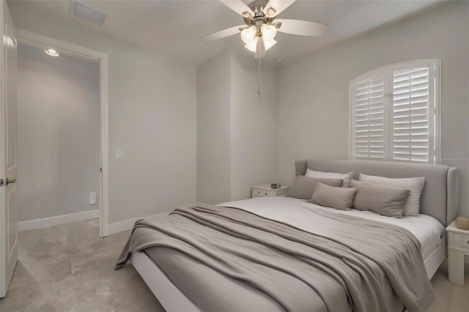 VIRTUALLY STAGED second bedroom with large walk-in closet