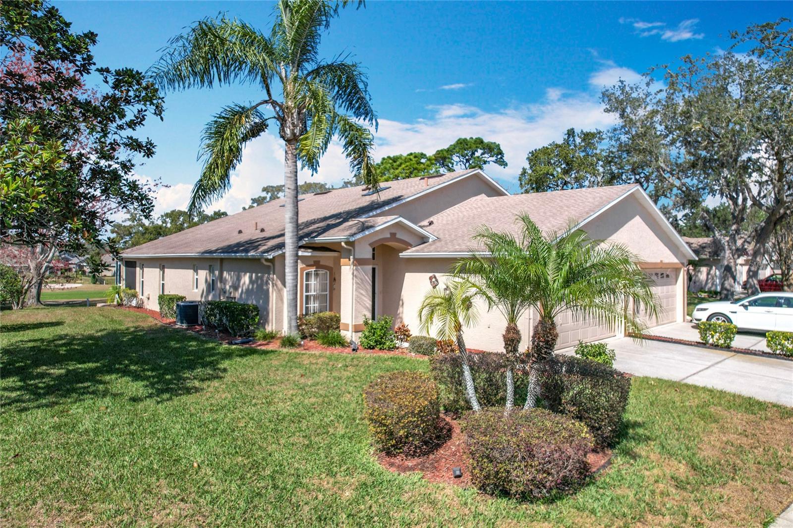 Welcome to 13252 Norman Circle. Located in Fairway Villas at Meadow Oaks. This is a 1,265 sq. ft. 2 bedroom, 2 bathroom, 2 car garage villa. Backs onto the 14th fairway at the public golf course Meadow Oaks.