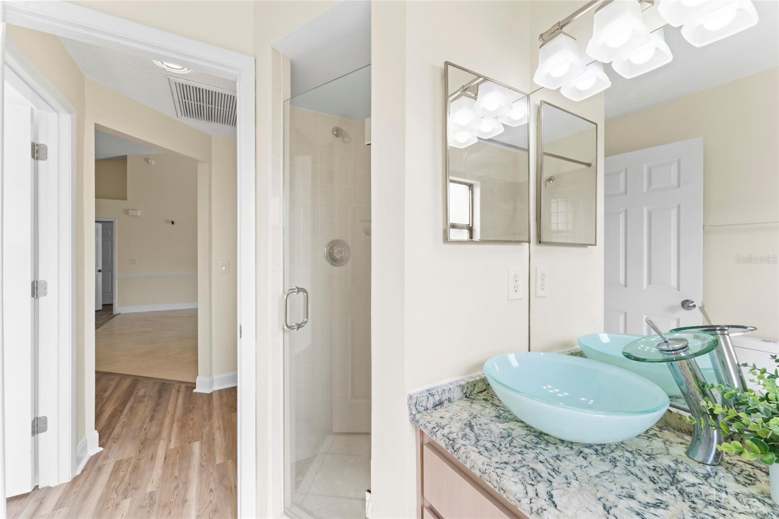 Secondary bathroom features a walk in shower AND tub!