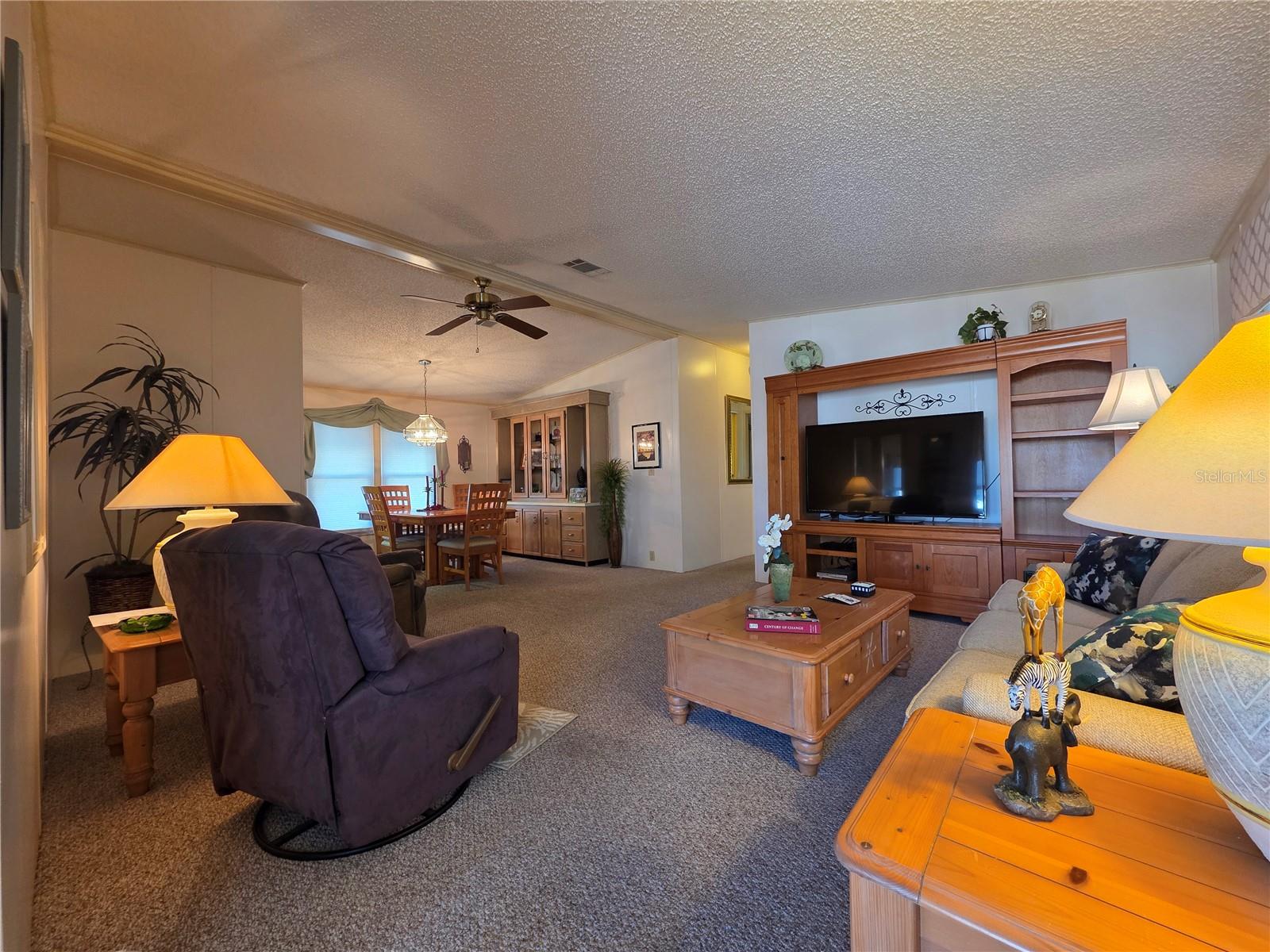 Open concept floor plan Living room and dining area.