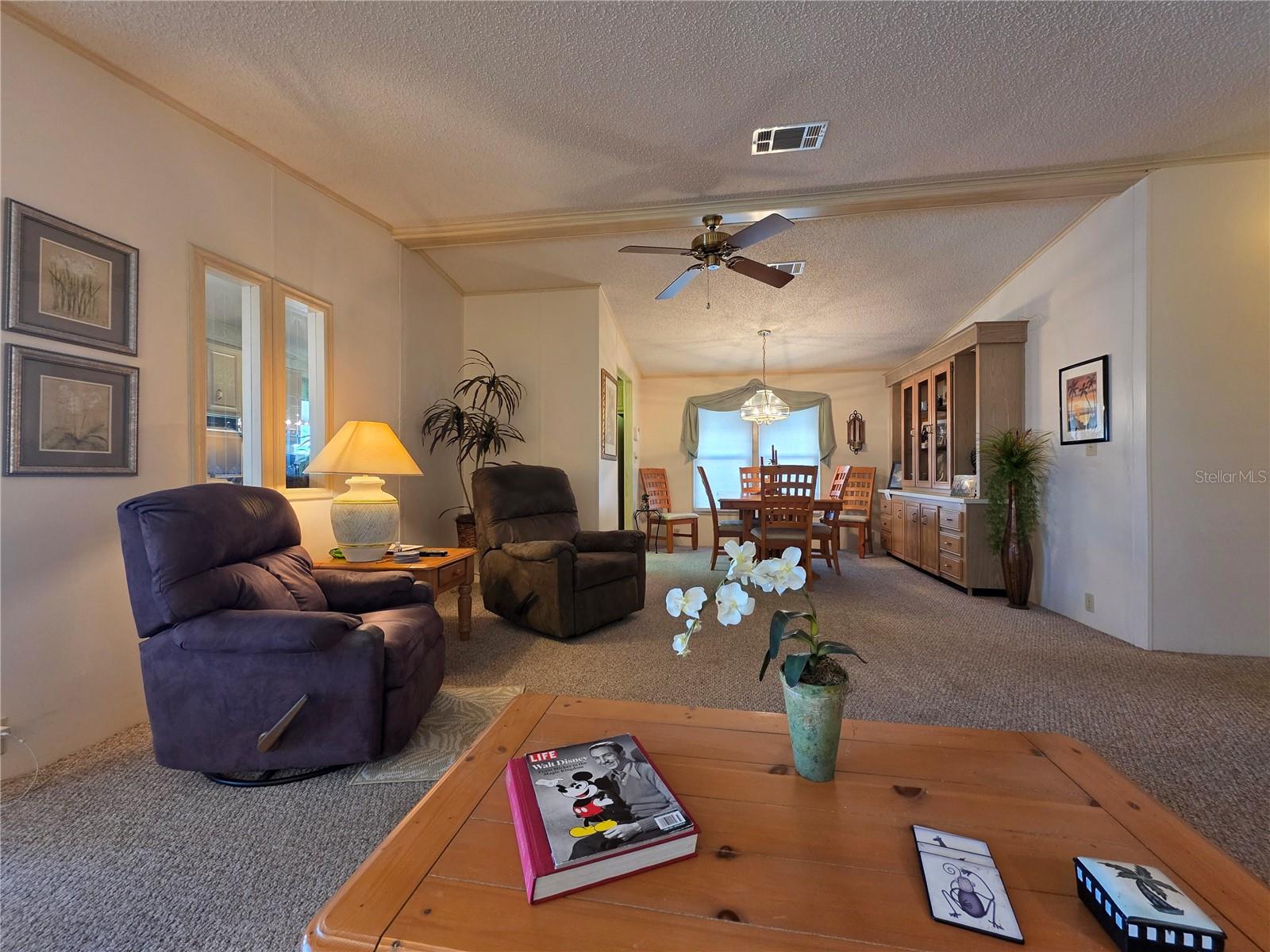 Open concept floor plan Living room and dining area.