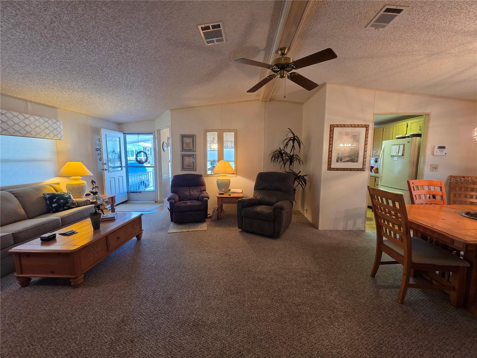 Open concept floor plan Living room and dining area.