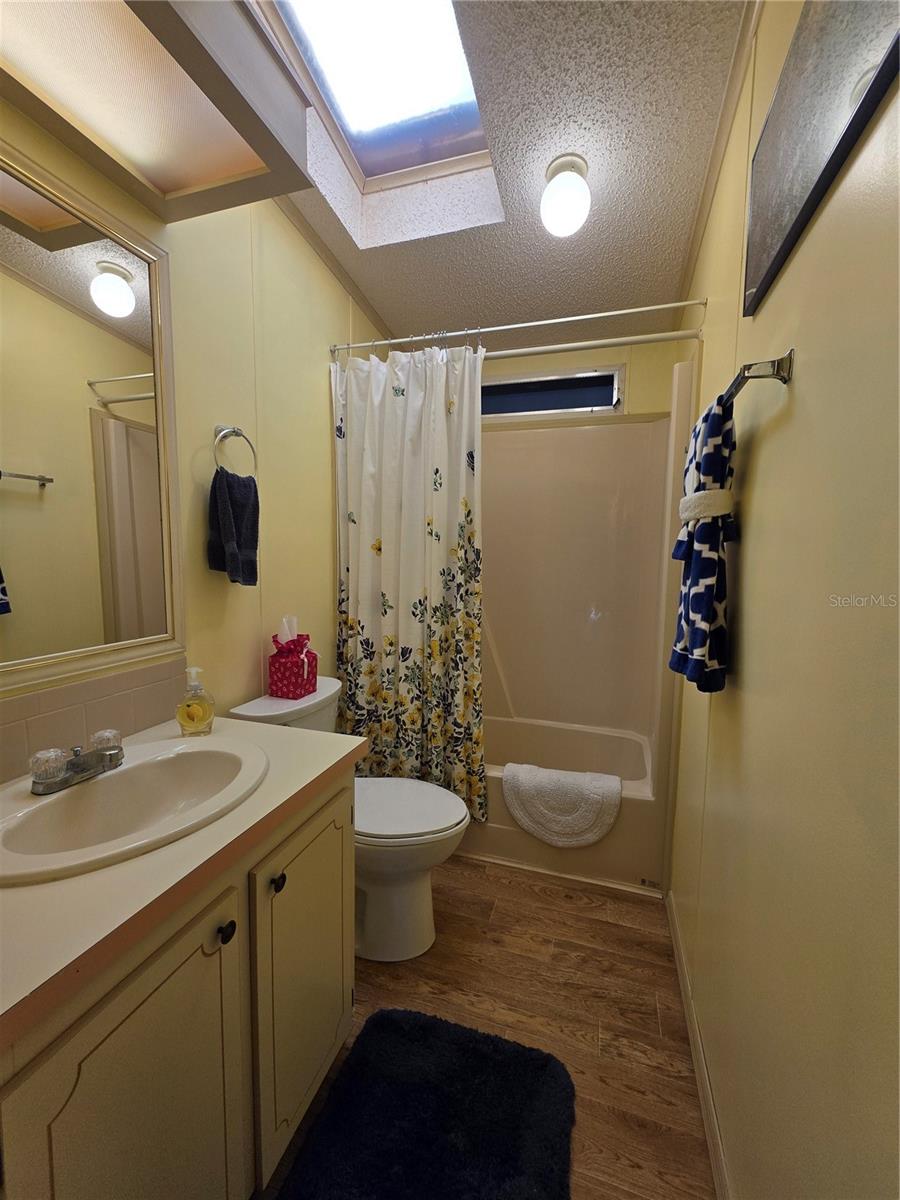 Main Bathroom with linen closet.