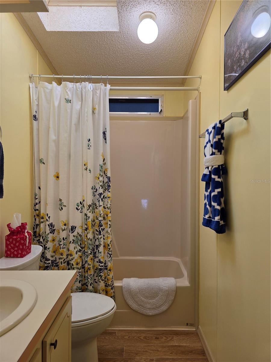 Main Bathroom with linen closet.