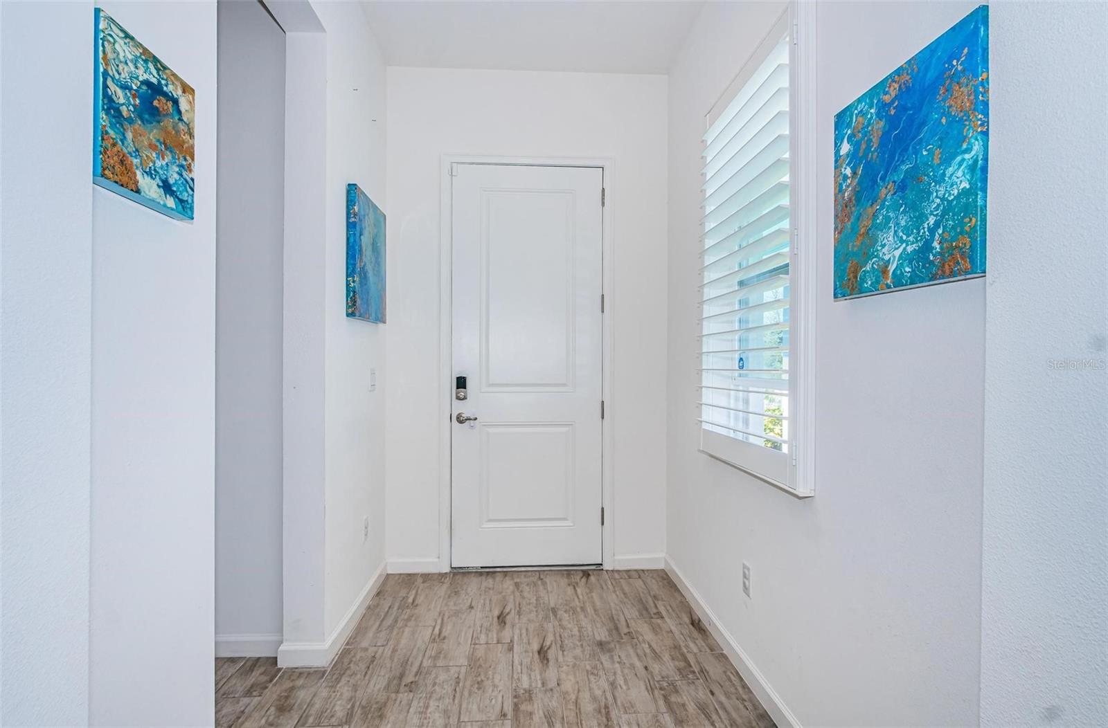 Peaceful front entry way faces the Preserve.
