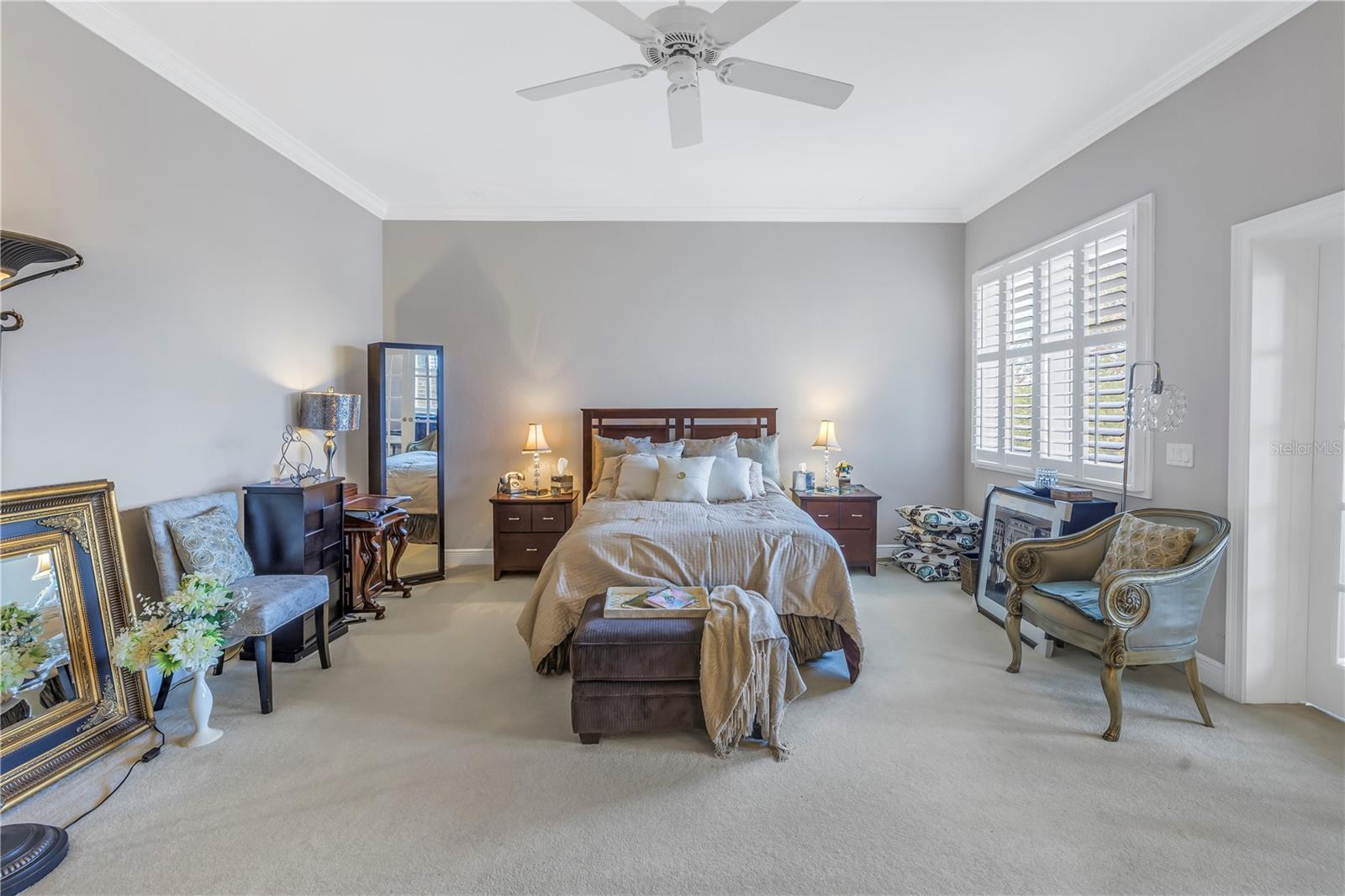 Primary bedroom offers lots of natural light