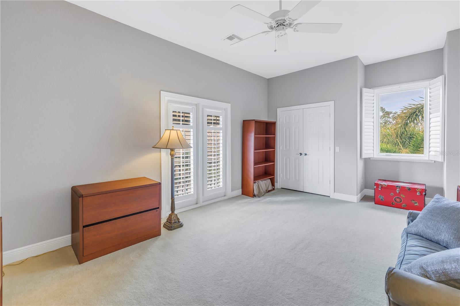 French doors open to a Juliet balcony in the 3rd suite