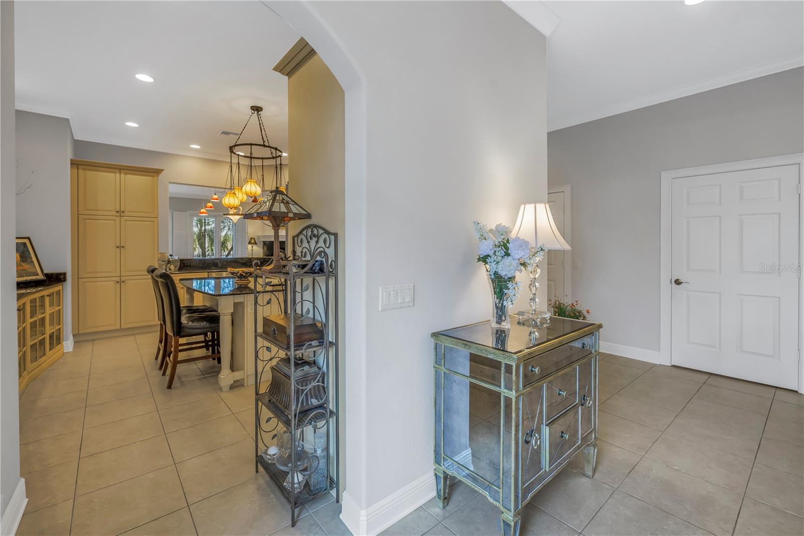 Front entry view to foyer & kitchen