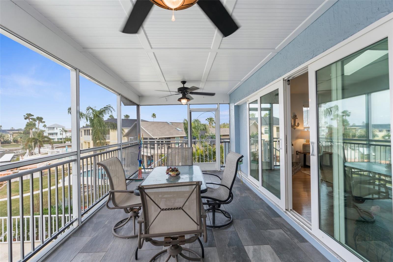 Screened and Covered Lanai on secondary Level off Living Room