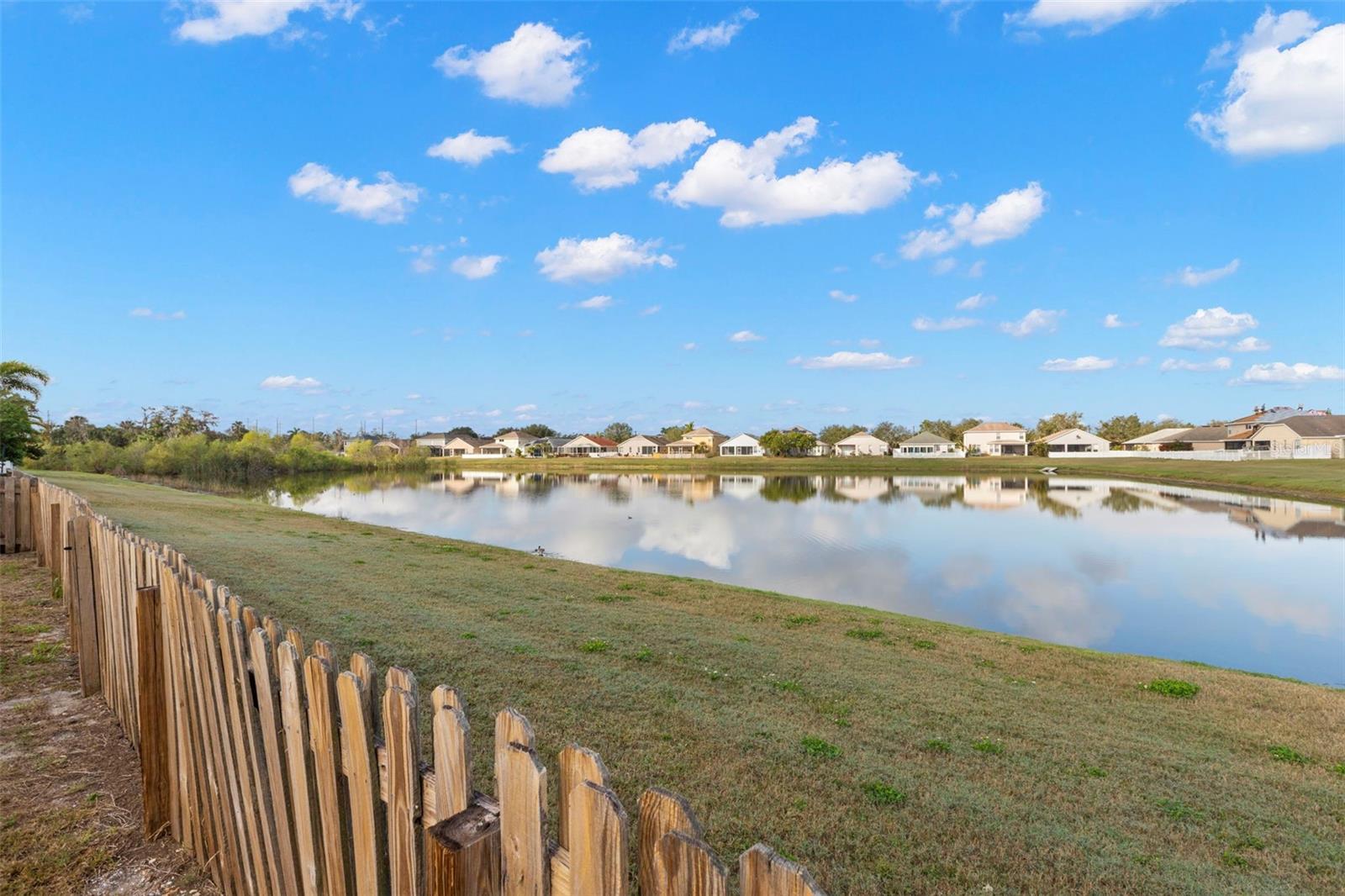 Fenced Yard with Water Views