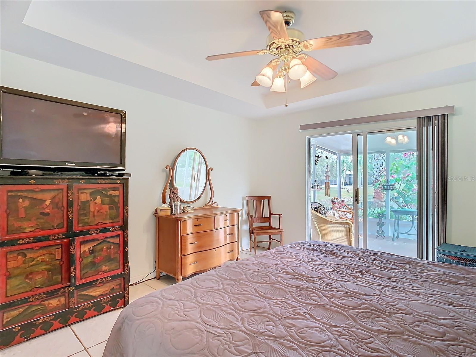 Primary bedroom with ceiling fan