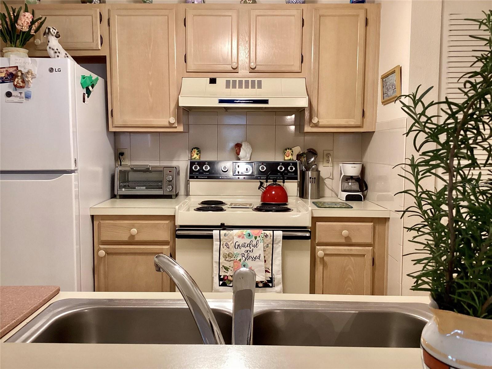 Kitchen open to living and dining area.