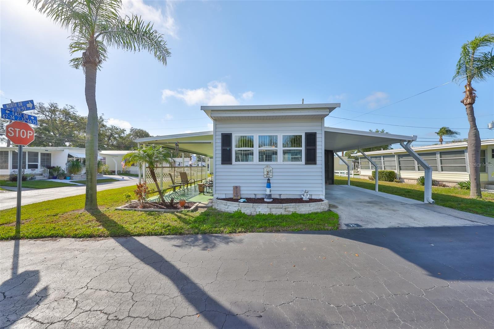 One of two driveways; One in the back of the home leading into Florida Room, the other is located in the front of home.