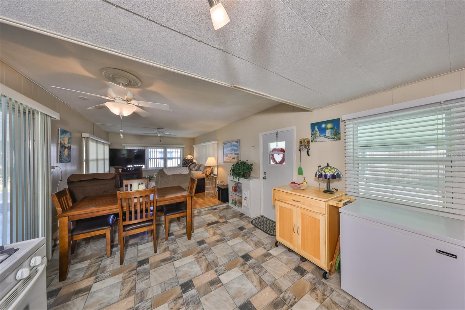 Kitchen and dining area are open to the family room.