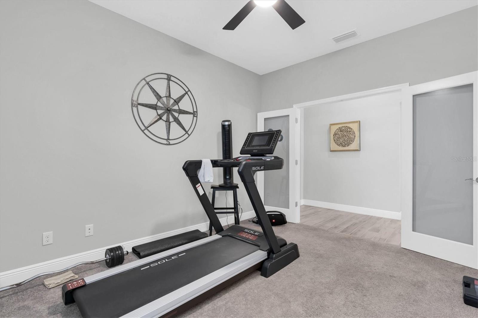 Office/workout room with french doors