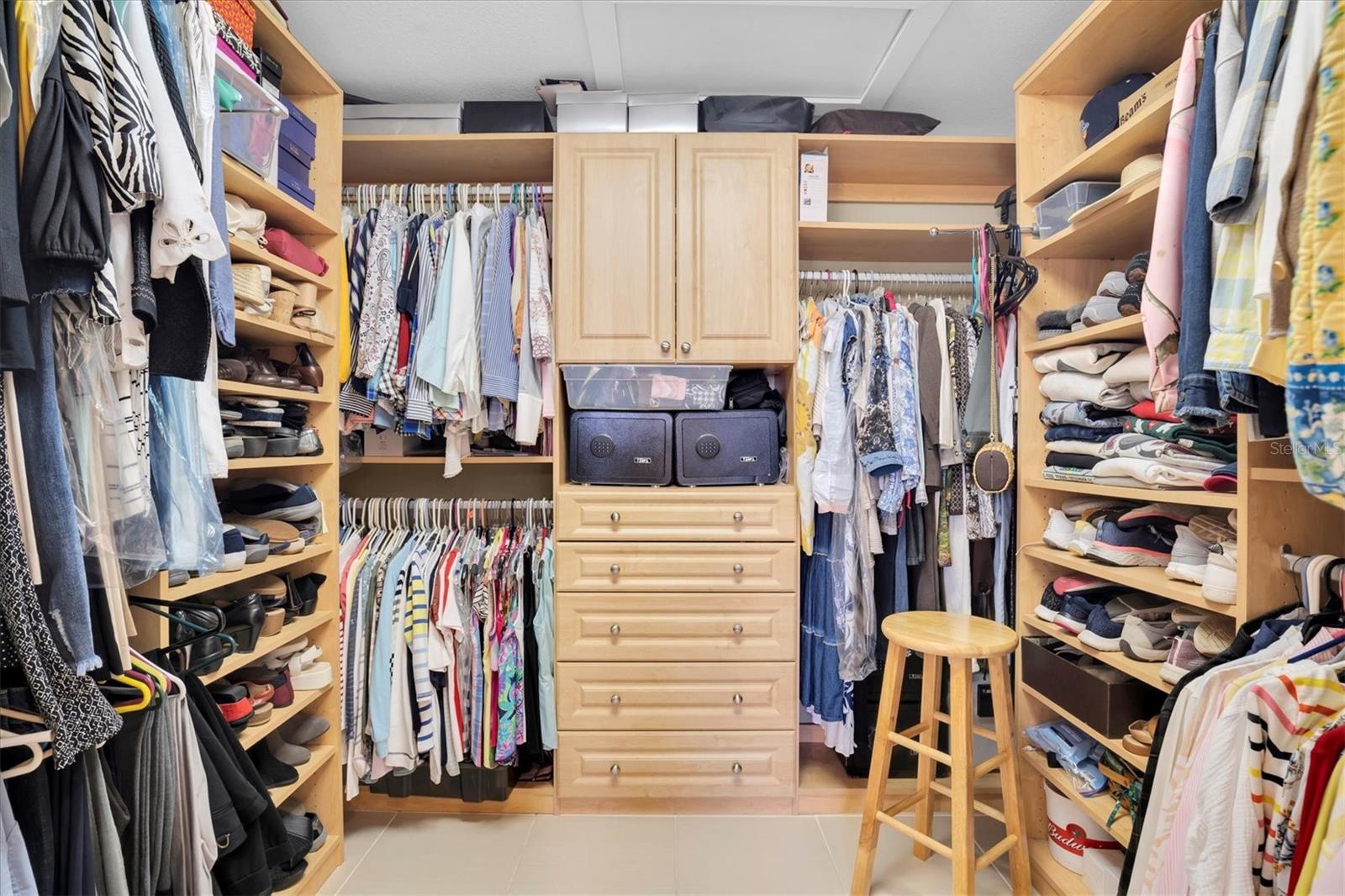 Walk in closet with custom closet design