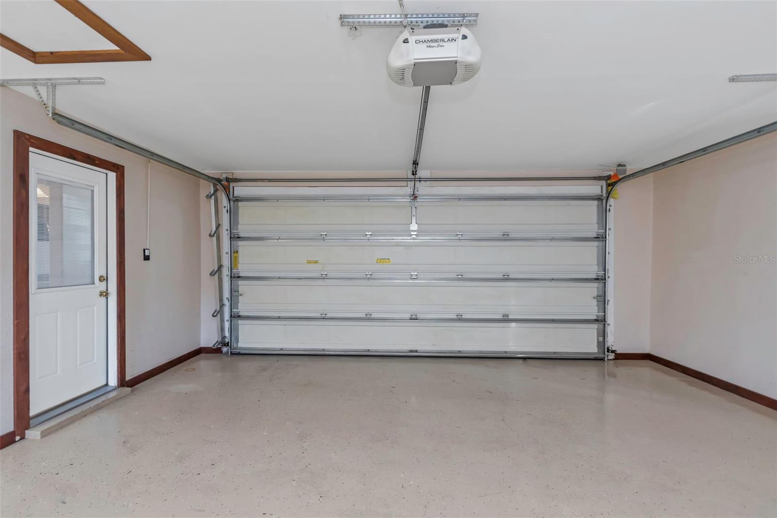 Hurricane rated and insulated garage door