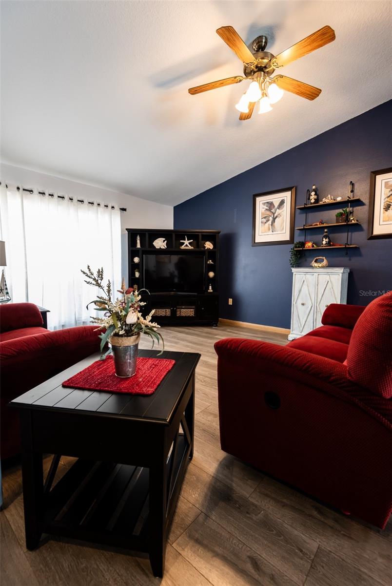 standing in dining room looking at living room