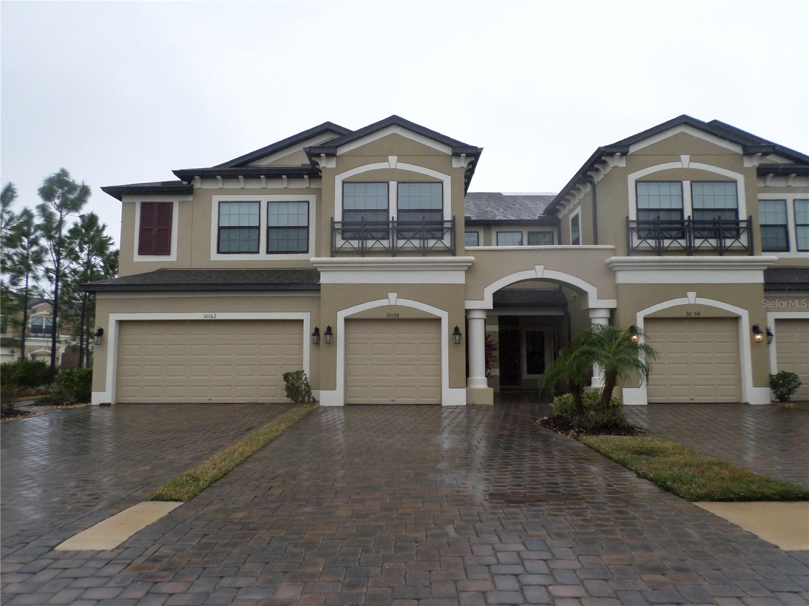 Driveway can accommodate 4 cars.