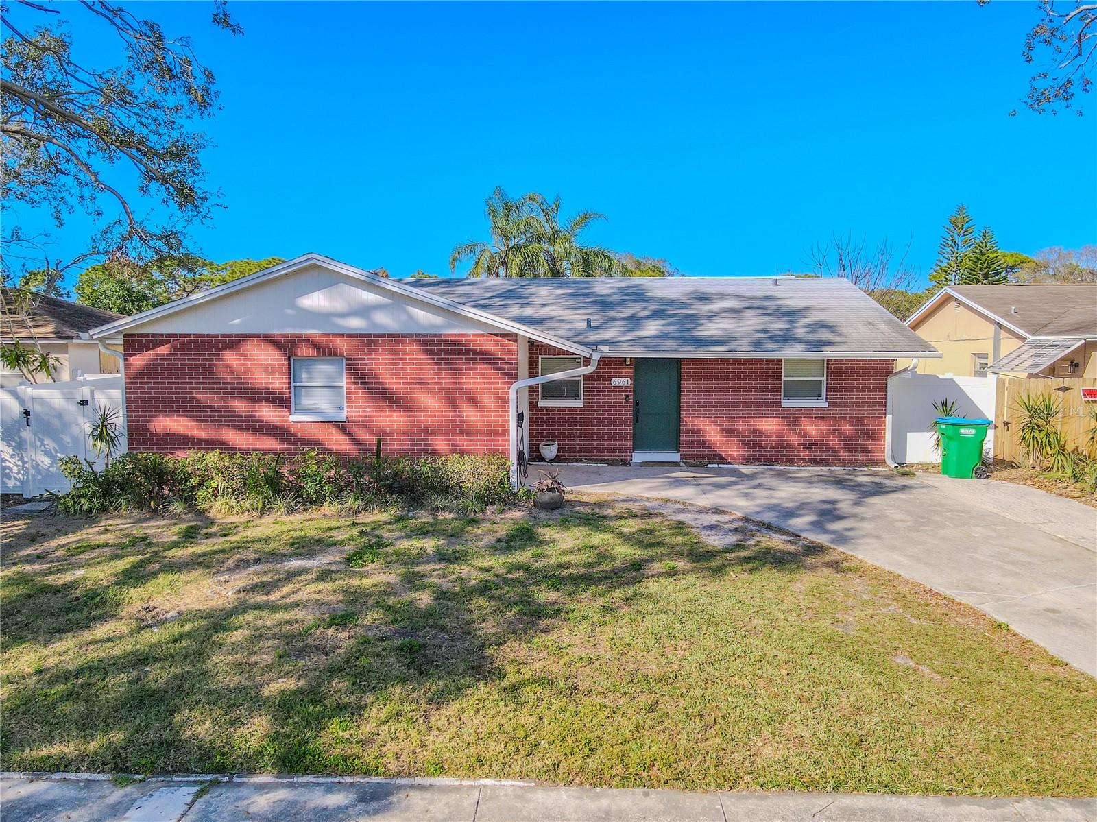 Located on a quiet street with mature shade trees.