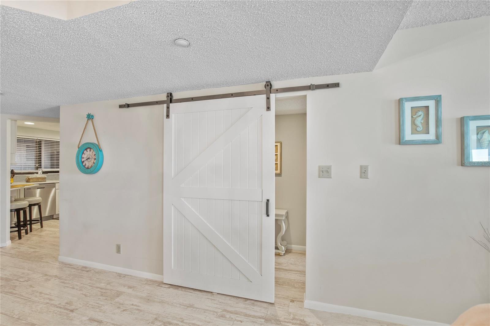 Close off the guest space  with this stylish barn door.