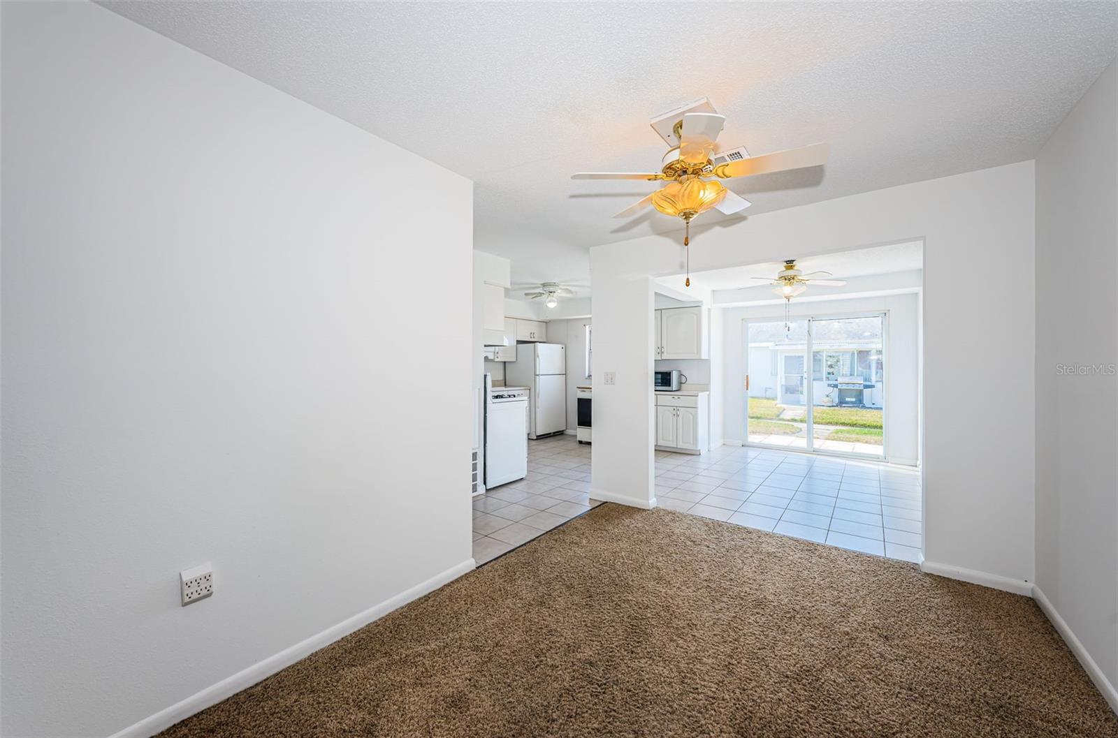 Livingroom looking to the dinette and kitchen