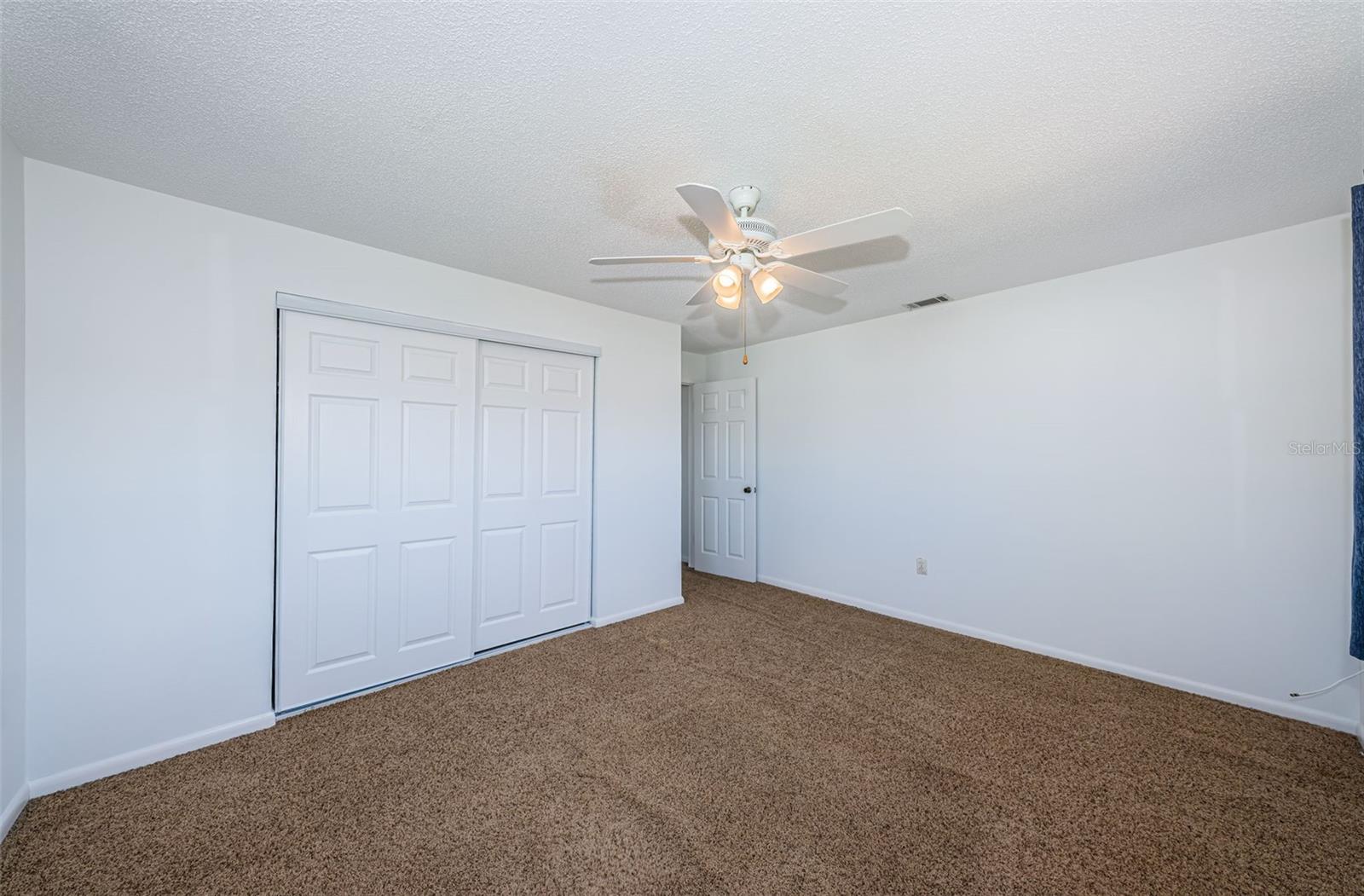 Primary bedroom with built-in closets