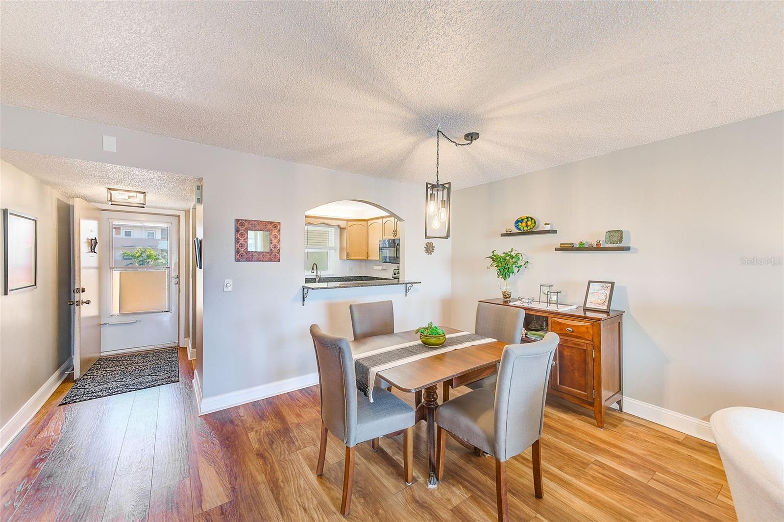 Dining Room with custom expanded pass through.  If you would like a breakfast bar just add some bar stools!