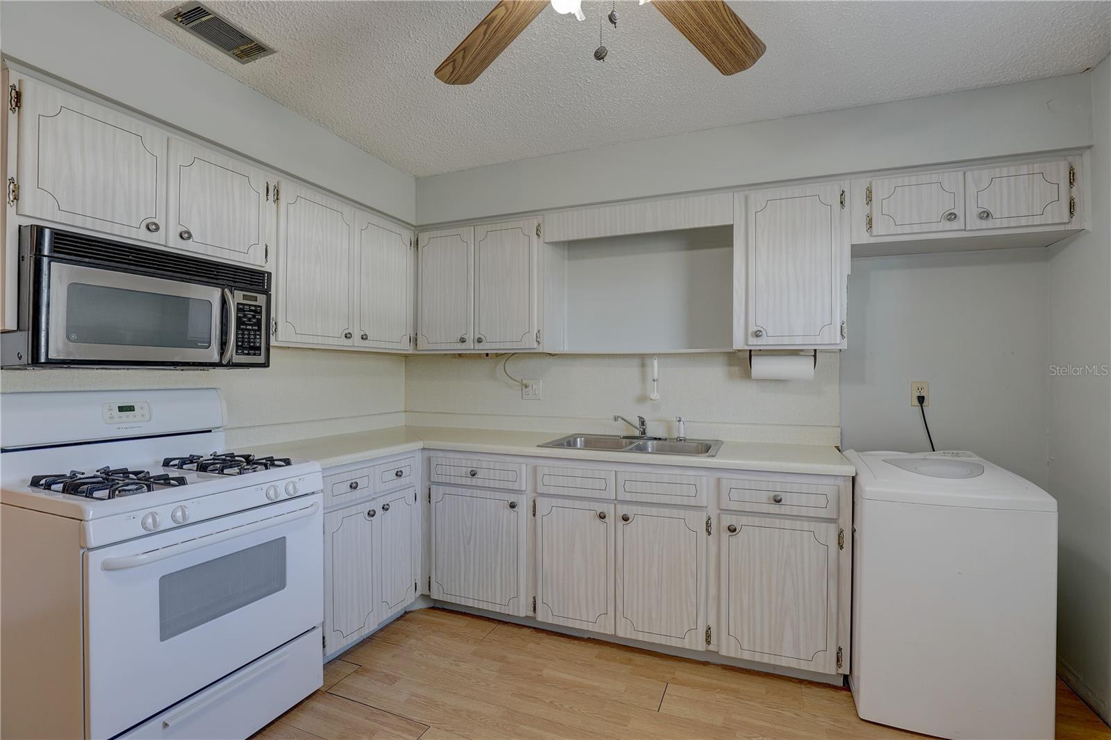 Kitchen with washing machine