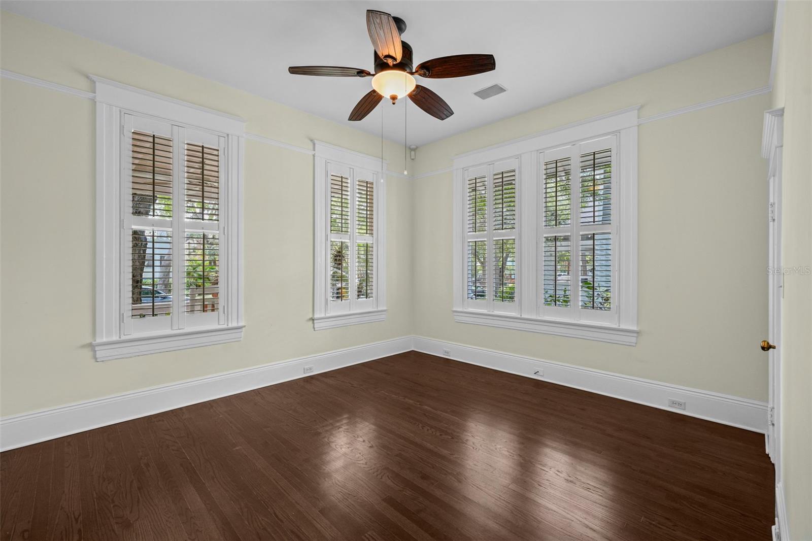 Downstairs bedroom, office or casual family room .... endless options!