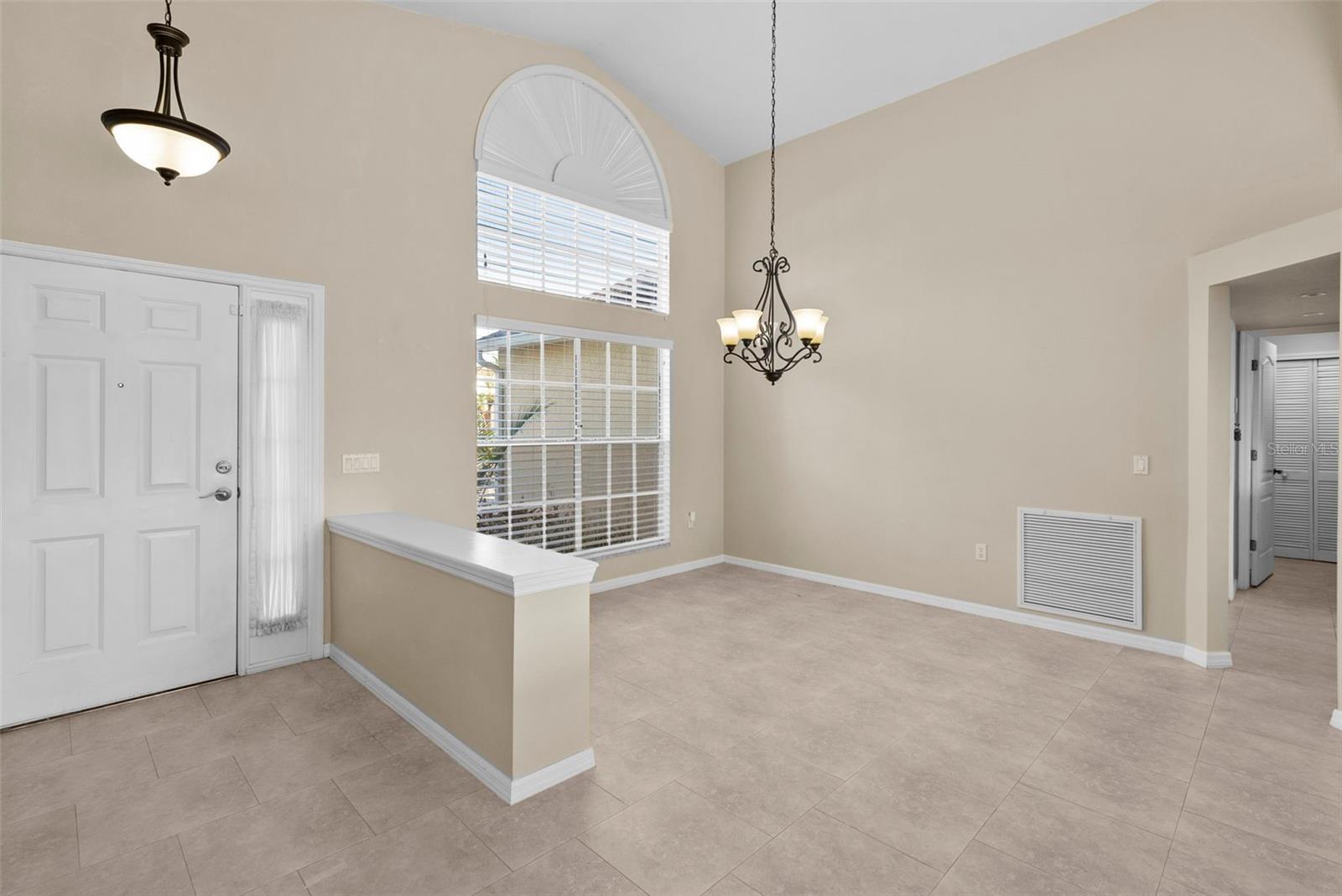 Entry way and formal dining room area