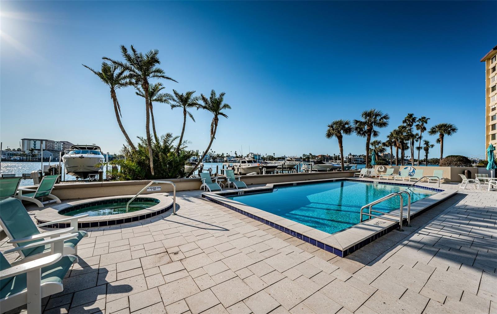 Sunworshipper's Waterfront Heated Pool & Spa, Outdoor Grilling. Fun on the Tennis & Pickleball Courts.  Boater's Paradise with Boat Slip Purchase Option based on Availability