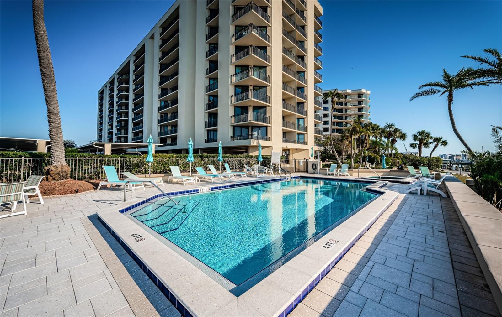 Waterfront Heated Pool & Spa, Outdoor Grilling. Bask in the Sun, Fun on the Tennis & Pickleball Courts.