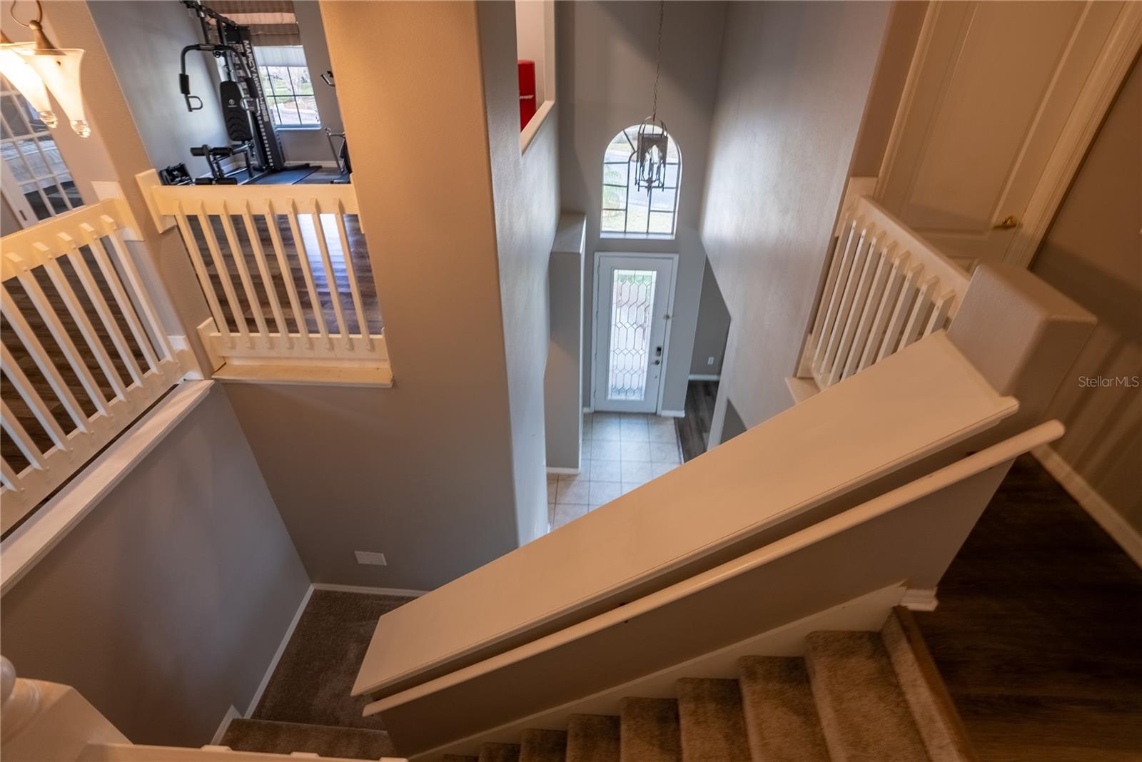Looking down stairs to the front door