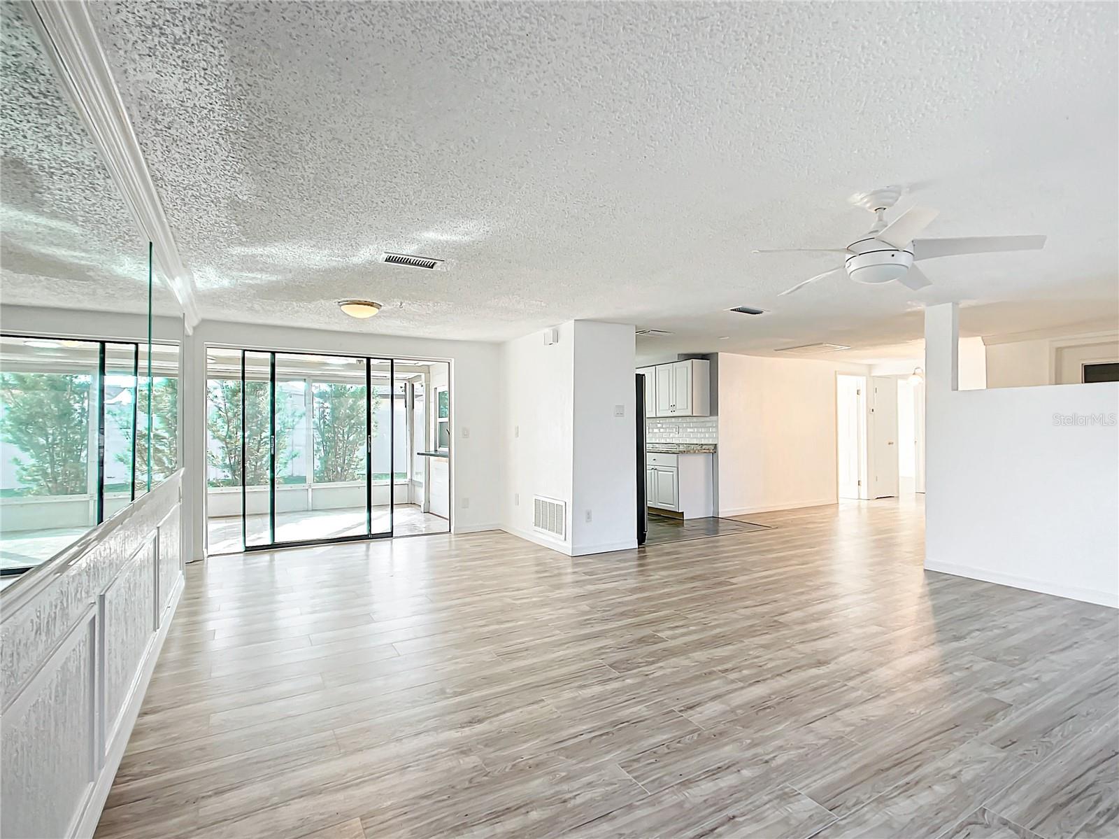 living room opens up to lanai