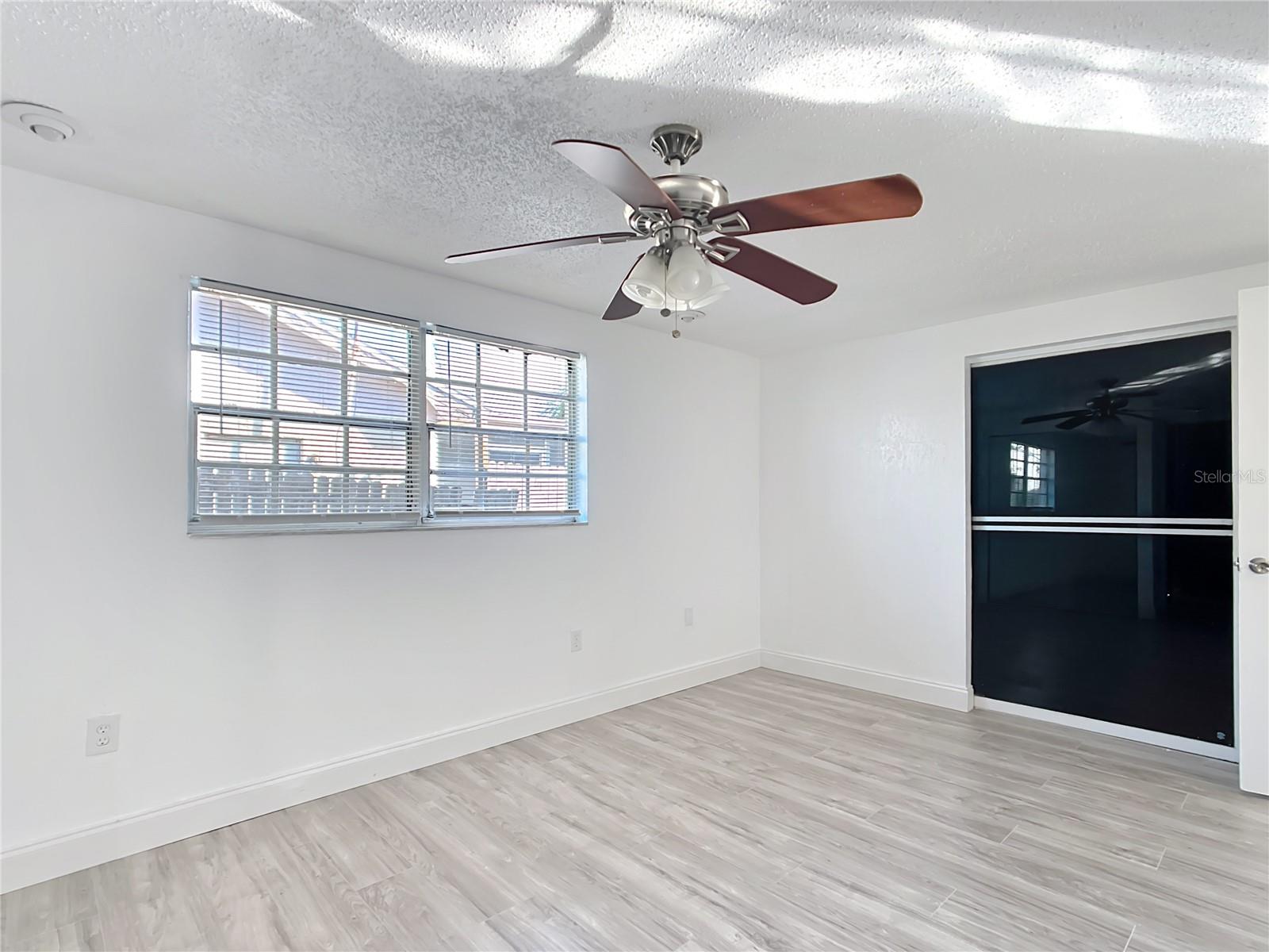 primary bedroom has a slider to Lanai