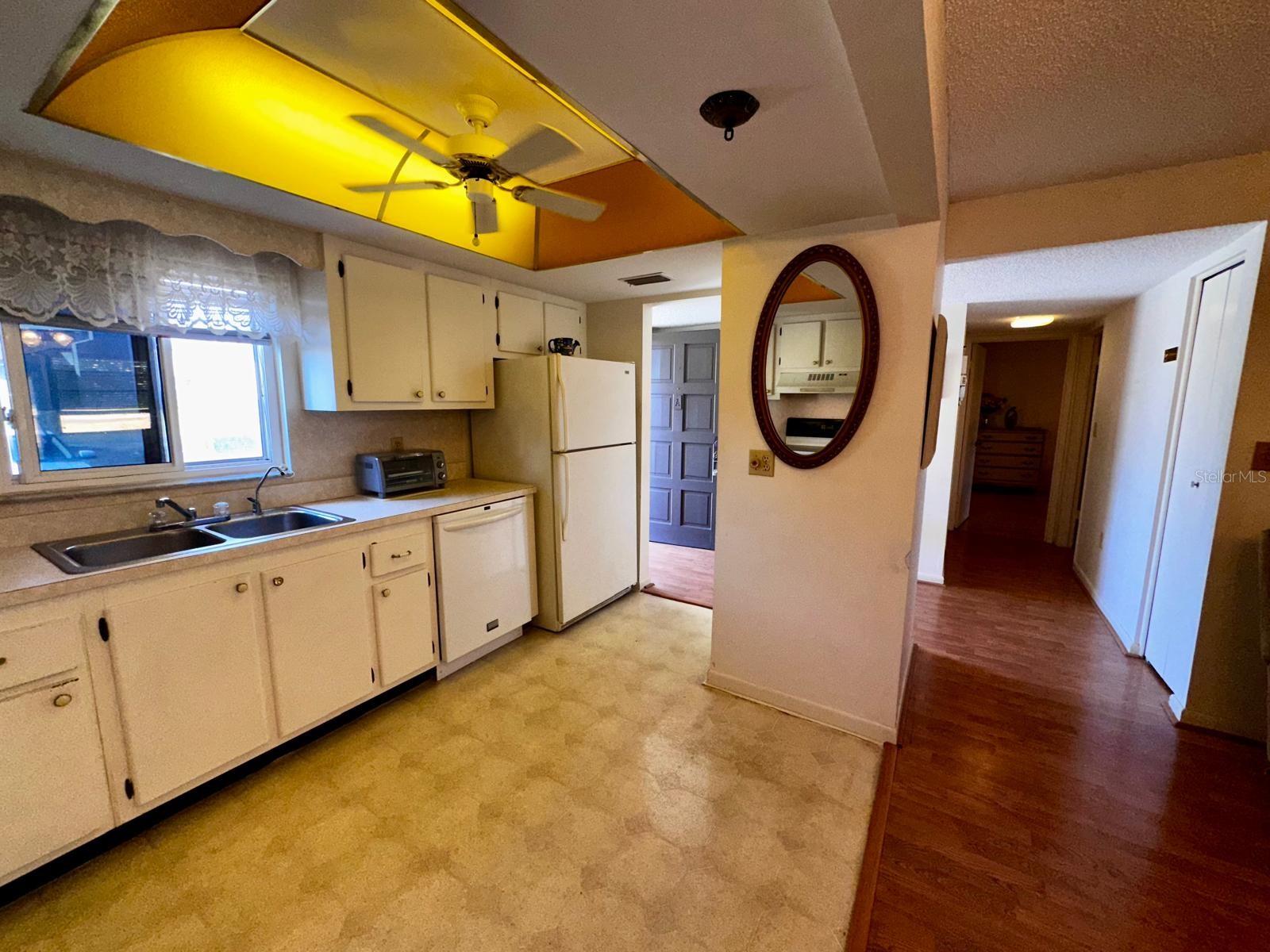 Kitchen Leading to Foyer and 2 Bedrooms and 2 Bathrooms
