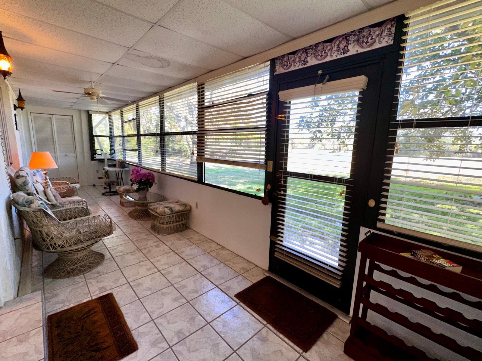 LARGE Enclosed Porch with 2 large storage closets