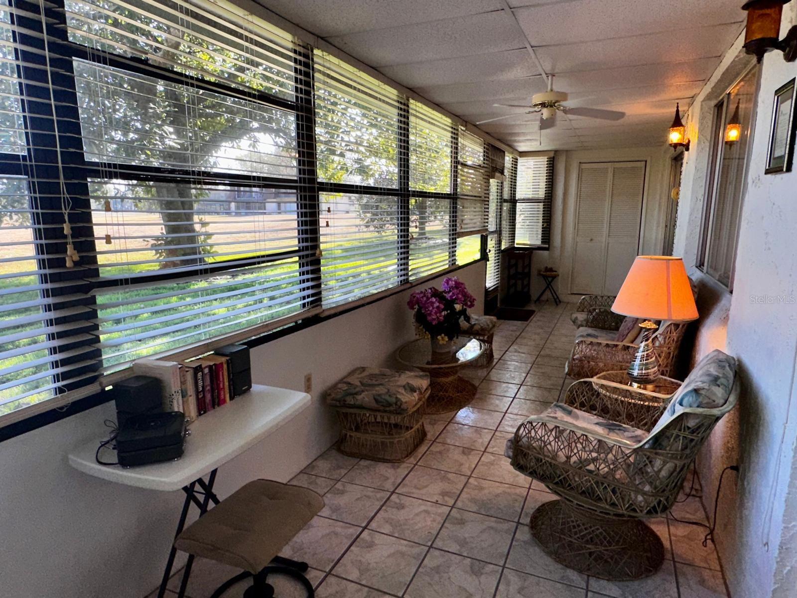 LARGE Enclosed Porch with 2 large storage closets