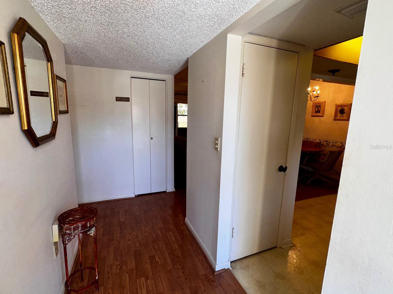 Foyer View showing Entry to Kitchen or Living Room to the Right