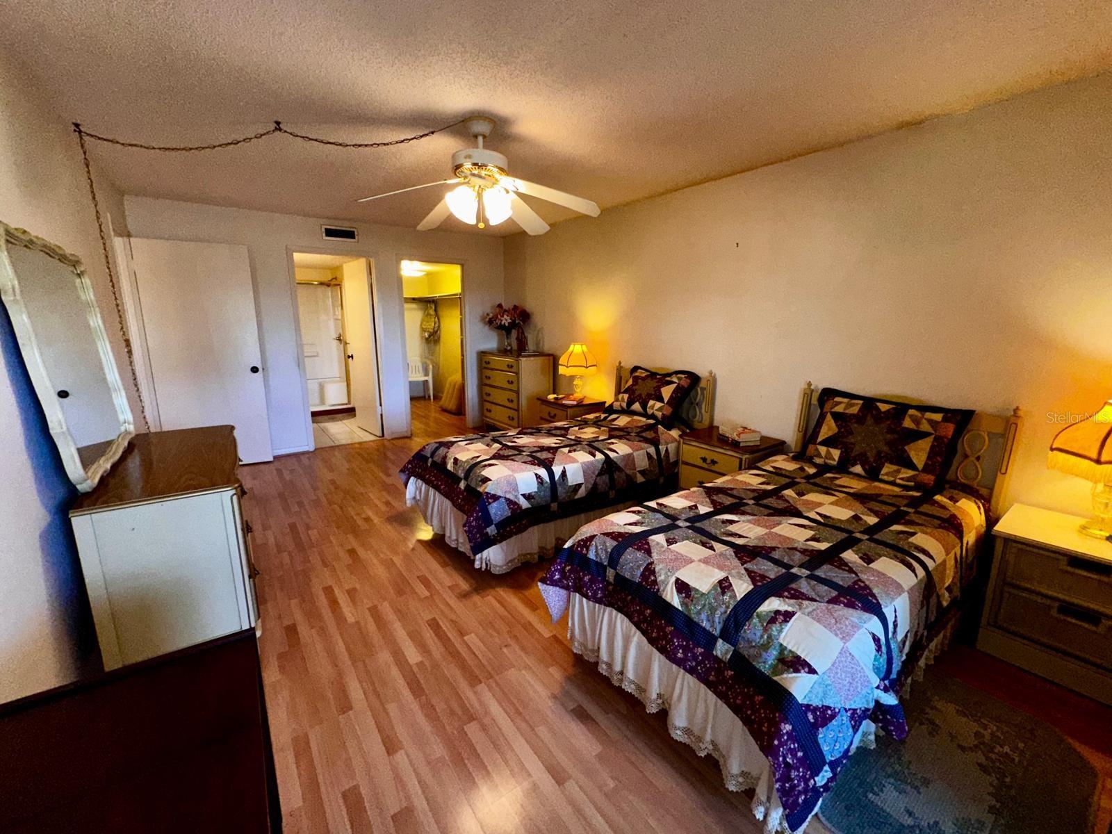 Master Bedroom showing ensuite bathroom and walk-in closet