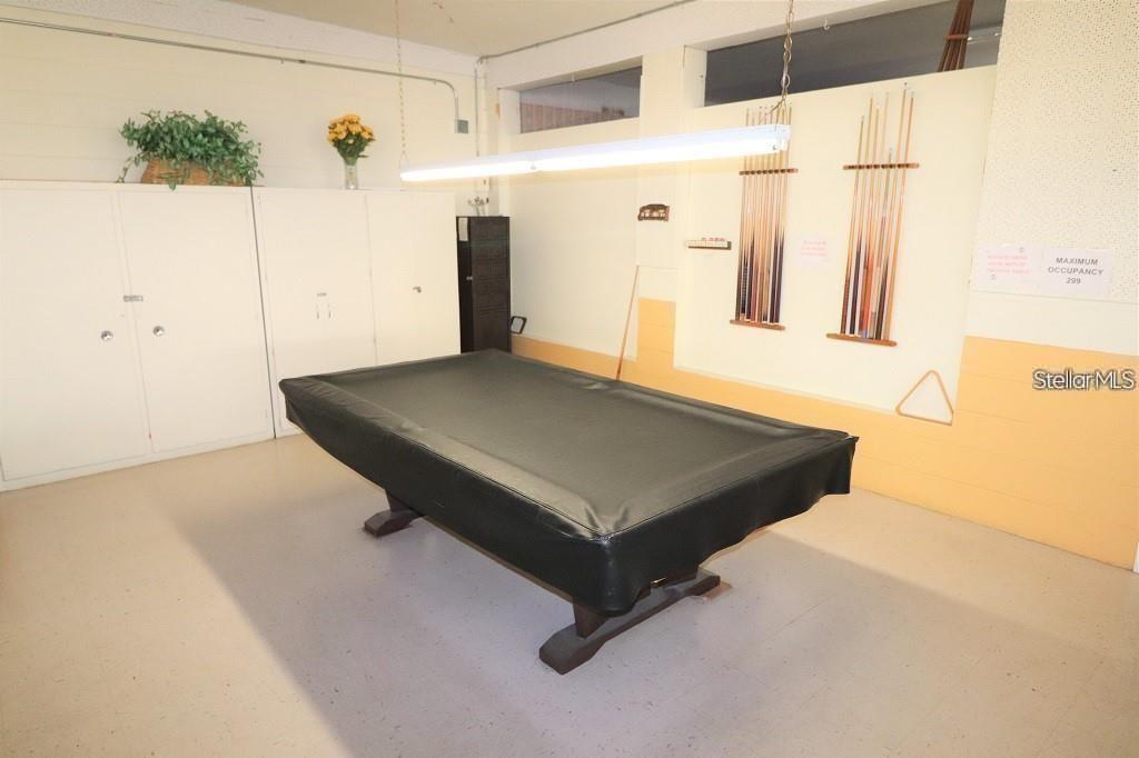 Pool table inside of the community clubhouse.