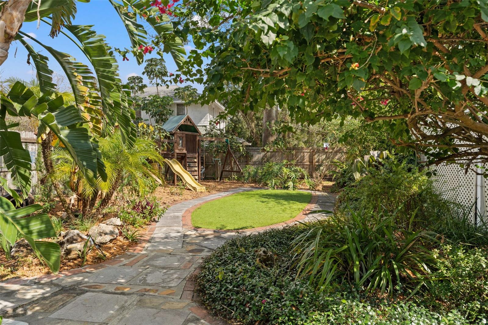 100% Fenced in with tropical landscape