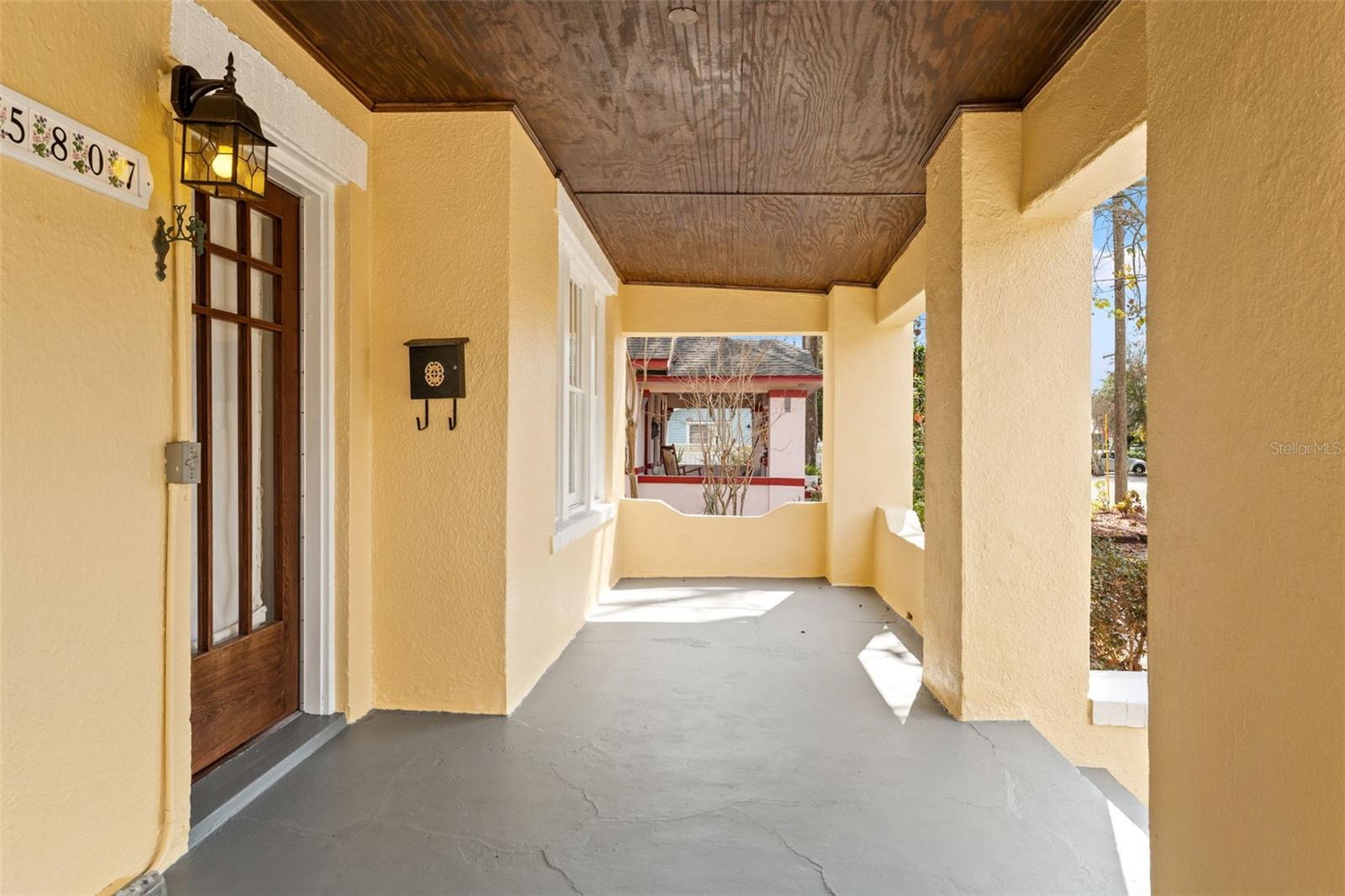 HUGE front porch with stained Tongue/Groove Ceiling