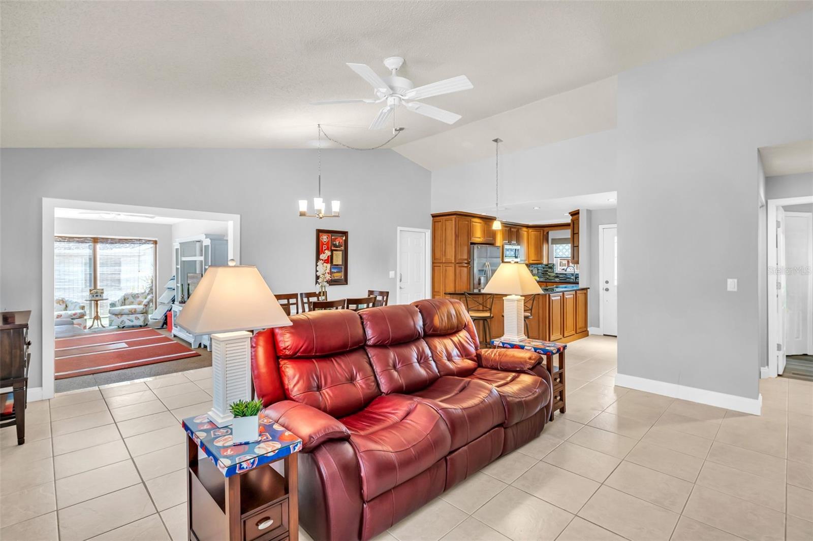 Bonus Florida room off the main living adding living square footage to enjoy year-round~