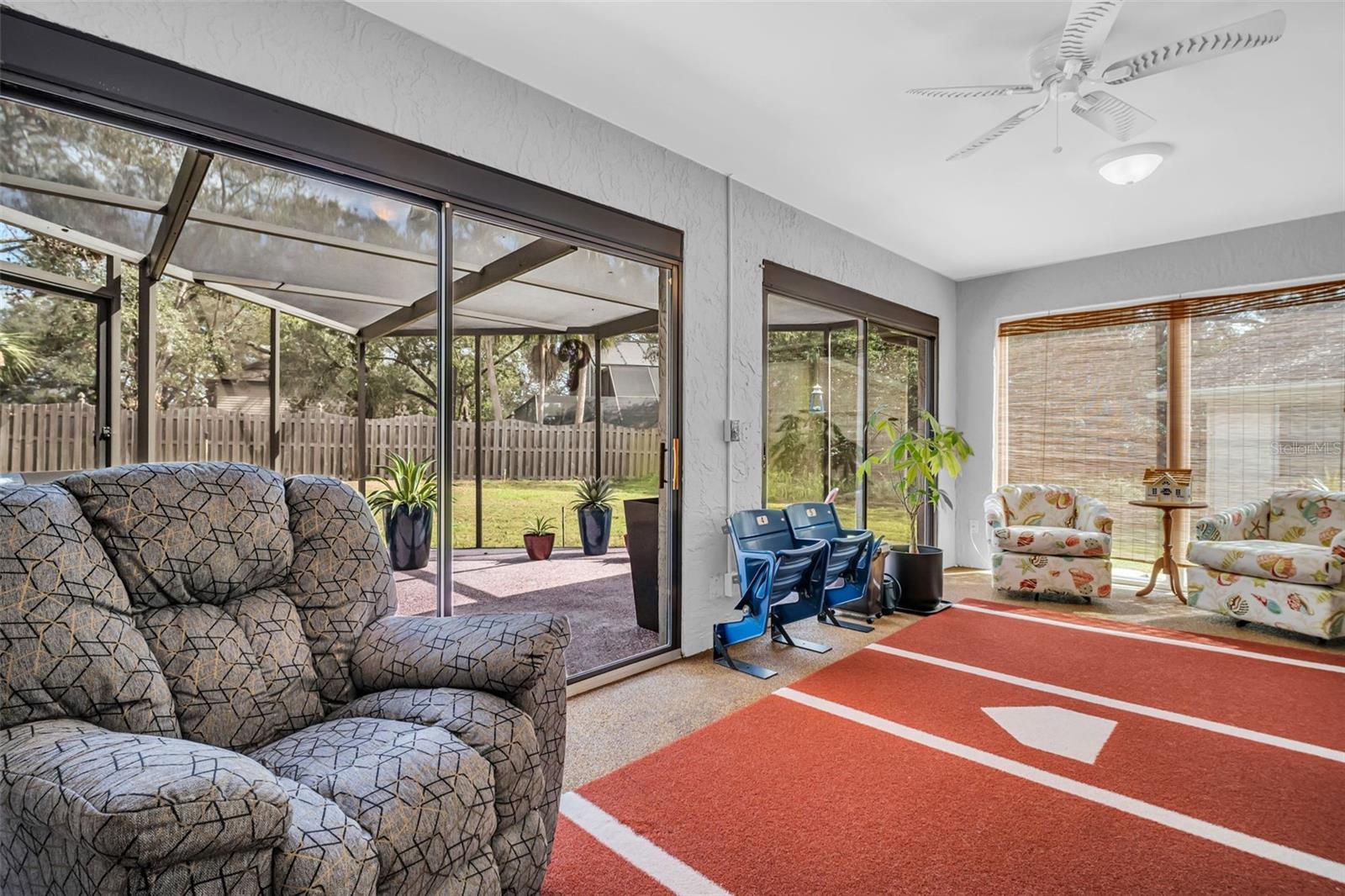 Newer sliders open to screened lanai for the perfect indoor/outdoor living~